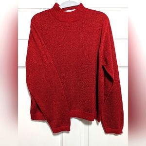 Glittery red, Size L long-sleeved top.